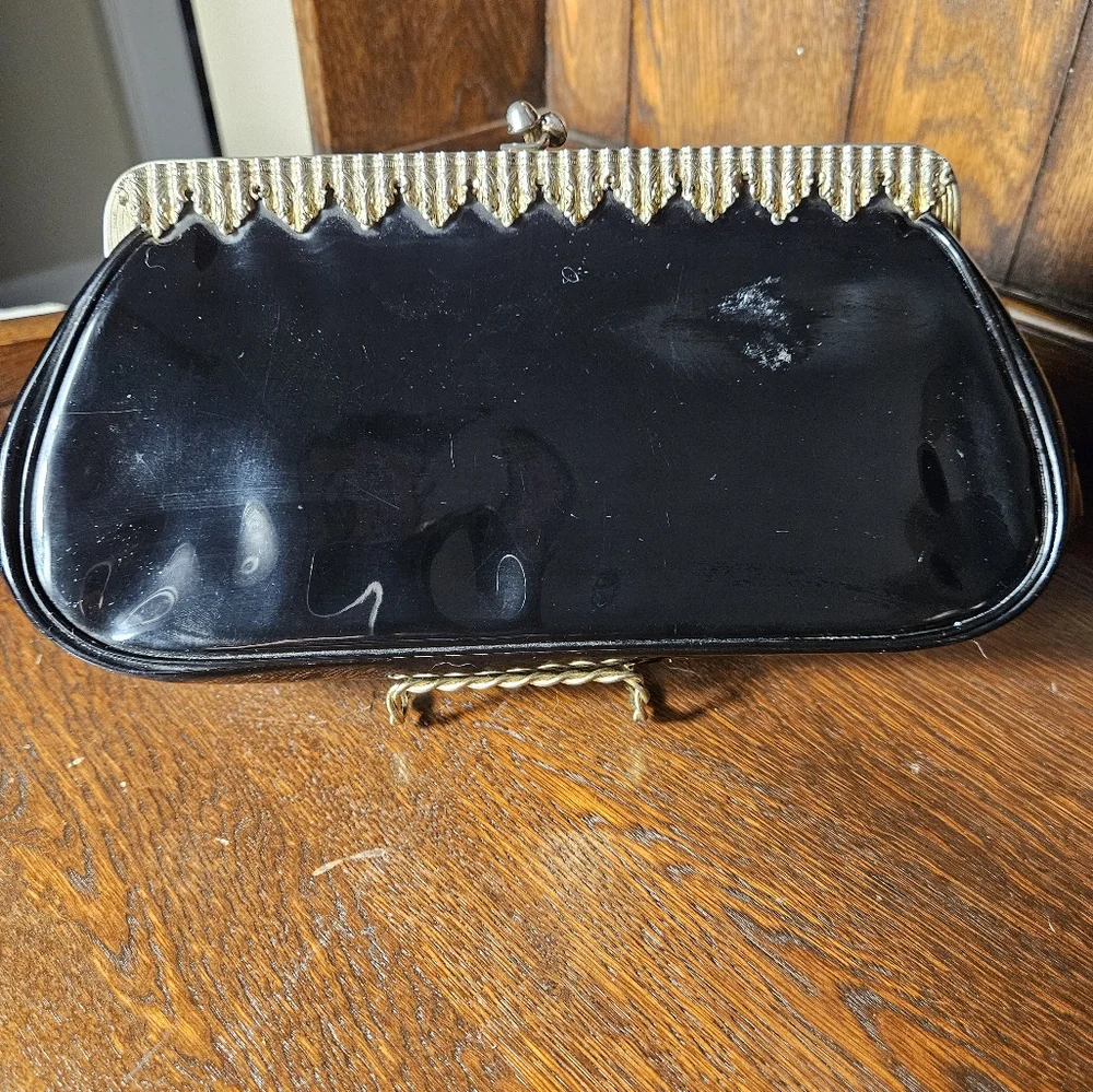 Elegant Black Clutch with Gold Accents